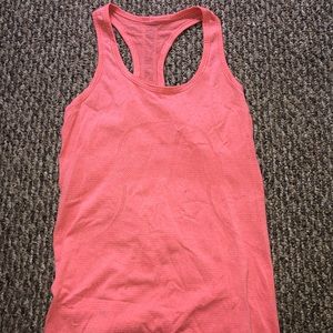 Orange Lululemon swiftly tech tank